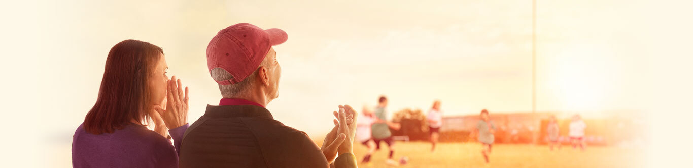 Hero image of soccer game spectators clapping